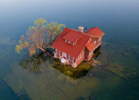 Hòn đảo nhỏ nhất thế giới, bé hơn cả sân tennis vẫn có người ở