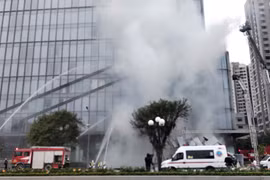 Hình ảnh lực lượng đặc biệt tham gia diễn tập tìm kiếm cứu nạn quy mô lớn tại tổ hợp nhà cao tầng