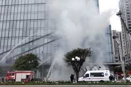 Hình ảnh lực lượng đặc biệt tham gia diễn tập tìm kiếm cứu nạn quy mô lớn tại tổ hợp nhà cao tầng