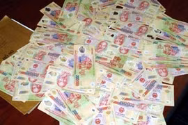  Bắt giam 3 đối tượng tiêu thụ lượng lớn tiền giả