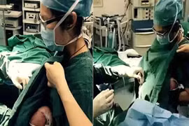 Xúc động cảnh nữ y tá dỗ bệnh nhi bú trước ca phẫu thuật
