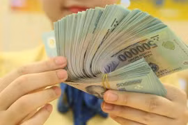Bộ Tài chính: Không bắt buộc doanh nghiệp phải chuyển khoản khi trả lương từ 5 triệu đồng
