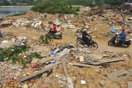 Sở Xây dựng trả lời về việc "chậm thi công, đầm Hồng bị bức tử"