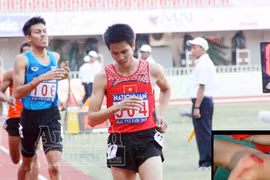 Dương Văn Thái cán đích với đầu gối rớm máu 