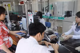 Cơ cấu lại hệ thống các tổ chức tín dụng gắn với xử lý nợ xấu 
