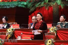 Hình ảnh các nữ đại biểu tham dự Đại hội XIII của Đảng