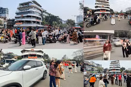 Người dân đổ về chụp ảnh check in với tòa nhà 'Hàm cá mập', bất chấp an toàn giao thông