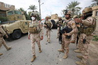 [Ảnh] Mỹ quyết định rút hết binh sĩ chiến đấu trực tiếp khỏi Iraq