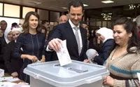 [ẢNH] Bashar al-Assad, người trụ vững giữa một chiến trường Syria đầy máu lửa