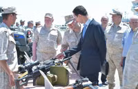[ẢNH] Bashar al-Assad, người trụ vững giữa một chiến trường Syria đầy máu lửa