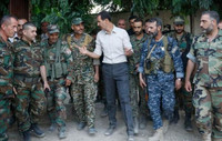 [ẢNH] Bashar al-Assad, người trụ vững giữa một chiến trường Syria đầy máu lửa