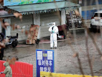 [ẢNH] WHO đến Trung Quốc điều tra nhưng không tìm được nguồn gốc đại dịch Covid-19