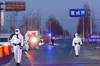 [ẢNH] WHO đến Trung Quốc điều tra nhưng không tìm được nguồn gốc đại dịch Covid-19