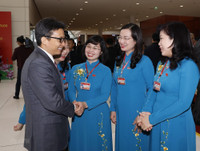 Hình ảnh các nữ đại biểu tham dự Đại hội XIII của Đảng