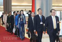 Hình ảnh các nữ đại biểu tham dự Đại hội XIII của Đảng