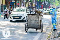 [ẢNH] Người lao động nhọc nhằn mưu sinh dưới thời tiết oi nóng của Hà Nội