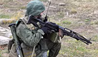 [ẢNH] Ukraine hốt hoảng khi quân ly khai miền Đông có súng máy hiện đại của đặc nhiệm Nga