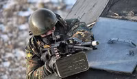 [ẢNH] Ukraine hốt hoảng khi quân ly khai miền Đông có súng máy hiện đại của đặc nhiệm Nga