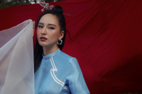 [ẢNH] Hoa hậu Mai Phương Thúy: Diện áo dài cách tân, bỡ ngỡ trong lần đầu đón Tết xa nhà 