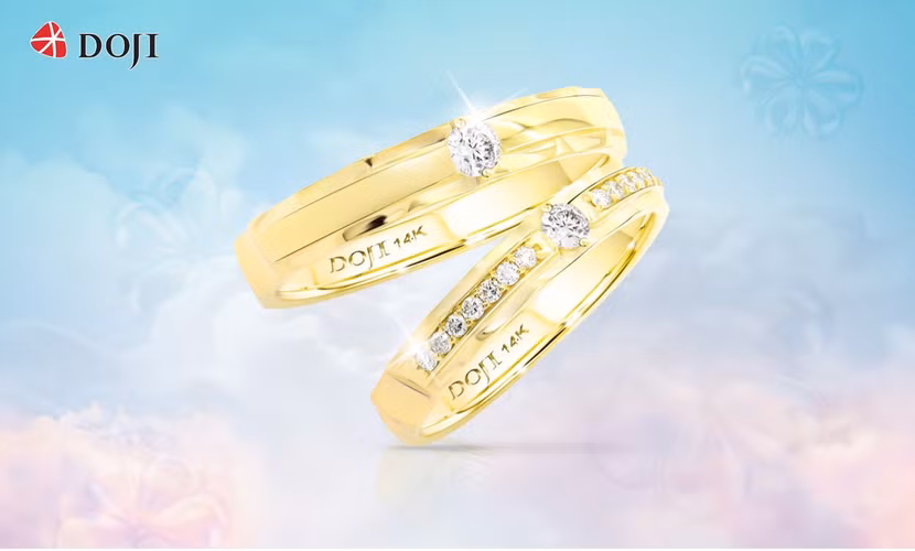 Cặp nhẫn cưới được đính kim cương vừa phải, kết hợp cùng dải kim cương tấm lấp lánh