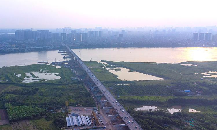 Sẽ có thêm nhiều công trình nghìn tỉ giúp tăng khả năng kết nối cho cư dân Vinhomes Ocean Park. Trong ảnh là cầu Vĩnh Tuy 2 đang được triển khai Sẽ có thêm nhiều công trình nghìn tỉ giúp tăng khả năng kết nối cho cư dân Vinhomes Ocean Park. Trong ảnh là cầu Vĩnh Tuy 2 đang được triển khai