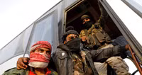 Thủ lĩnh nhóm Jaish al-Islam nộp vũ khí và rời khỏi Douma