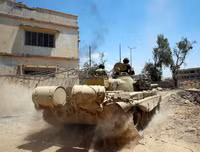 Ám ảnh nữ khủng bố ôm con nhỏ để đánh bom tự sát giết binh sĩ quân đội Iraq