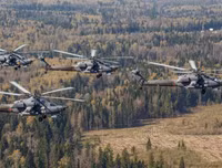 Sức mạnh đáng sợ của trực thăng tấn công Mi-28 Nga tại Syria