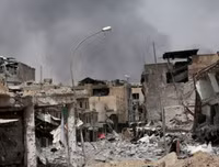 Ám ảnh nữ khủng bố ôm con nhỏ để đánh bom tự sát giết binh sĩ quân đội Iraq