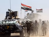 Ám ảnh nữ khủng bố ôm con nhỏ để đánh bom tự sát giết binh sĩ quân đội Iraq