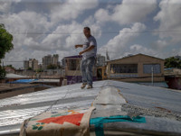 [Ảnh] Người Mỹ hối hả trong guồng quay chống đỡ siêu bão Dorian