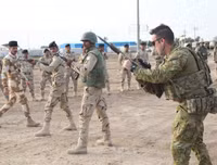 Vì đâu Mỹ từ chối rút quân, thậm chí dọa ngược Iraq?