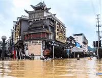 [Ảnh] Chưa hết đợt dịch Covid-19 thứ hai, Trung Quốc lại ứng phó với lũ lụt lịch sử