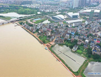 [Ảnh] Chưa hết đợt dịch Covid-19 thứ hai, Trung Quốc lại ứng phó với lũ lụt lịch sử