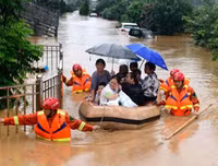 [Ảnh] Chưa hết đợt dịch Covid-19 thứ hai, Trung Quốc lại ứng phó với lũ lụt lịch sử
