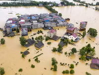 [Ảnh] Chưa hết đợt dịch Covid-19 thứ hai, Trung Quốc lại ứng phó với lũ lụt lịch sử
