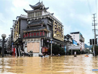 [Ảnh] Chưa hết đợt dịch Covid-19 thứ hai, Trung Quốc lại ứng phó với lũ lụt lịch sử