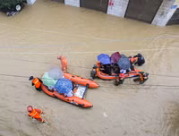 [Ảnh] Chưa hết đợt dịch Covid-19 thứ hai, Trung Quốc lại ứng phó với lũ lụt lịch sử