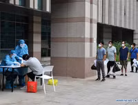 [Ảnh] Chưa hết đợt dịch Covid-19 thứ hai, Trung Quốc lại ứng phó với lũ lụt lịch sử