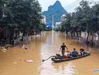 [Ảnh] Chưa hết đợt dịch Covid-19 thứ hai, Trung Quốc lại ứng phó với lũ lụt lịch sử