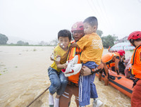 [Ảnh] Chưa hết đợt dịch Covid-19 thứ hai, Trung Quốc lại ứng phó với lũ lụt lịch sử