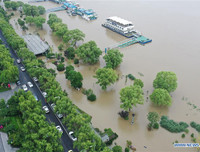 [Ảnh] Chưa hết đợt dịch Covid-19 thứ hai, Trung Quốc lại ứng phó với lũ lụt lịch sử