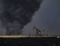 [Ảnh] Nga: Mỹ là thổ phỉ dầu quốc tế tại Syria