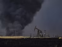 [Ảnh] Nga: Mỹ là thổ phỉ dầu quốc tế tại Syria