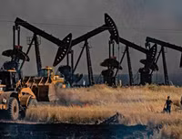 [Ảnh] Nga: Mỹ là thổ phỉ dầu quốc tế tại Syria