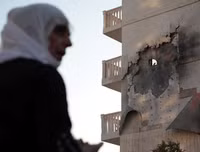 [Ảnh] Không còn gì sau khi Mỹ đặt bom tự phá hủy căn cứ ở Bắc Syria