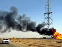 Vì đâu Mỹ từ chối rút quân, thậm chí dọa ngược Iraq?