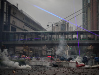 Cảnh sát Hồng Kông lý giải việc lần đầu tiên nổ súng và phun vòi rồng để ứng phó với biểu tình