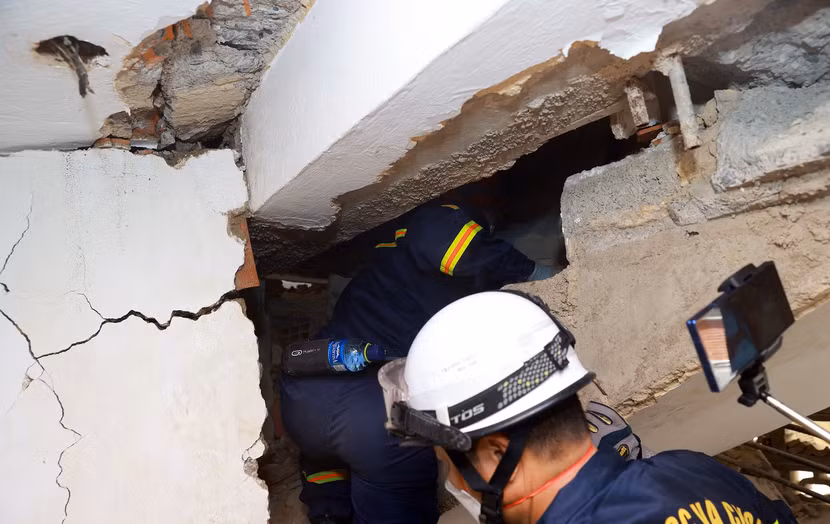 Quyết tâm tìm kiếm nạn nhân động đất Venezuela với bản lĩnh và tinh thần trách nhiệm cao nhất ảnh 11