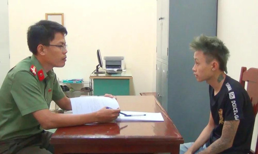 Trần Ngọc Chung tại cơ quan công an